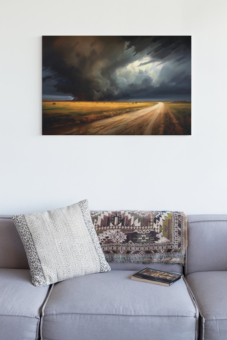 May include: A painting of a dirt road leading into a field with a dark storm cloud in the background.