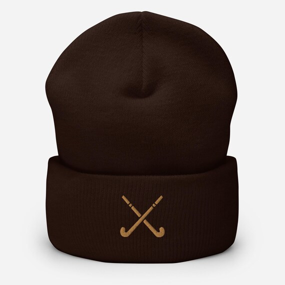 Hockey, Feldhockey Mütze in Braun mit Stickerei in Hellbraun, gekreuzte Schläger „Brown- Maroon“