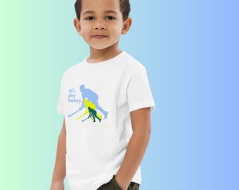 Bio-Baumwoll-T-Shirt mit Hockeyspielerin –Design für Kinder by StudioSaltHy black, white,