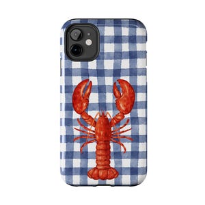 May include: A phone case featuring a watercolor illustration of a red lobster on a blue and white gingham pattern. The case is designed to fit a smartphone and has a glossy finish.
