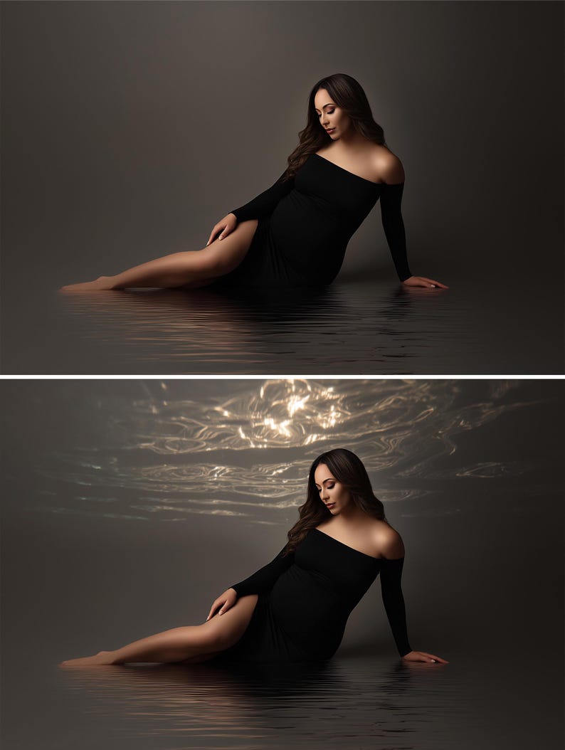May include: A woman wearing a black off-the-shoulder dress with long sleeves, sitting in water. The dress has a thigh-high slit. The background is a dark gray, with the water reflecting the light. The woman has long, dark hair.