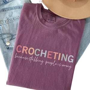 crocheting because stabbing people is wrong comfort colors shirt