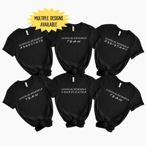 May include: Six black t-shirts with different text designs in a rainbow font. The text on the shirts reads "Clinical Research Associate", "Clinical Research Team", "Clinical Research Assistant", "Clinical Research Coordinator", and "Clinical Research Team".