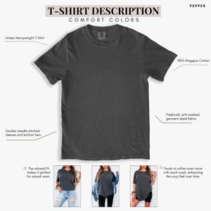 May include: A dark grey unisex heavyweight t-shirt. The shirt is made of 100% ringspun cotton and features double-needle stitched sleeves and bottom hem. The fabric is preshrunk, soft washed, and garment-dyed. The relaxed fit enhances the cosy feel over time.