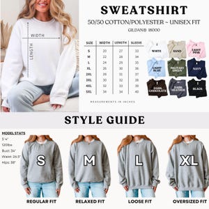 May include: A white Gildan 18000 unisex sweatshirt size chart and style guide. The image displays a white sweatshirt, a table of measurements in inches for sizes S to 5XL, color swatches, and four grey sweatshirts showing S, M, L, and XL fits.
