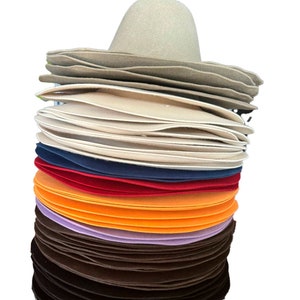 May include: A stack of felt hats in various colors, including beige, white, navy blue, red, orange, purple, brown, and black.