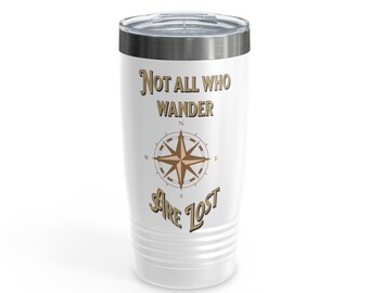 May include: White stainless steel tumbler with a brown compass and the text "Not all who wander are lost".