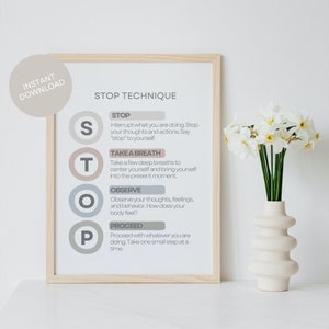 May include: A printable poster with a beige background and a wooden frame. The poster features a STOP technique acronym with four steps: Stop, Take a Breath, Observe, and Proceed. Each step is represented by a circle with a letter and a description.