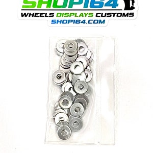 May include: A clear plastic bag filled with 50 silver 2-56 stainless steel washers. The bag is labeled "50 pc 2-56 SS Washers".