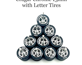 May include: A set of ten 13mm chrome Cragar wheels with Goodyear Eagle letter tyres. The wheels are arranged in a triangular shape.