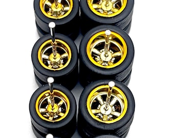 May include: Eight gold-plated Cragar wheels with black tires. The wheels are 11mm/13mm and have a staggered design.