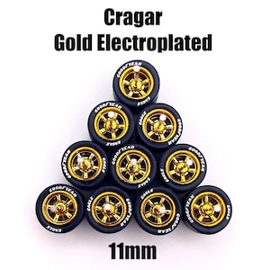 May include: A set of nine 11mm gold electroplated Cragar wheels with black Goodyear Eagle tires.