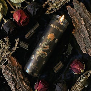“Ancestral veneration candle in dark ritual flat-lay with dried roses, herbs, bark pieces, and black tourmaline crystals, black meditation candle for ancestral connection and altar décor.”