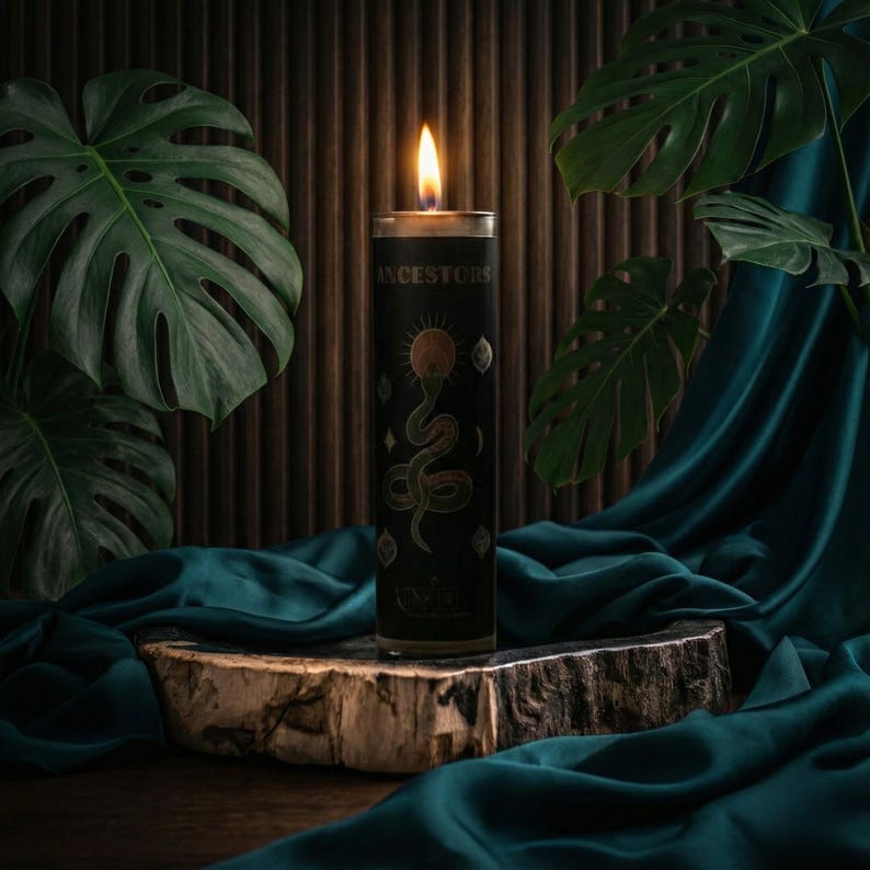“Ancestral connection candle burning on luxe stone display, black ritual candle with gold design, surrounded by plants and soft shadows, perfect for meditation, altar offerings, spiritual home sanctuary décor.”