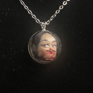 Decapitated Man necklace