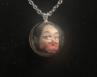Decapitated Man necklace