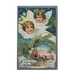 Postal vintage de 1908 "Niños ángeles en el cielo" - Feliz Navidad - Tuck and Sons - Matasellos sobre sello de 1 c. de Ben Franklin