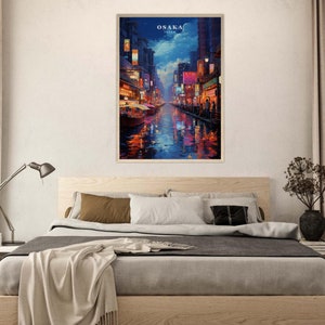 May include: A painting of a city street scene at night in Osaka, Japan. The street is lined with buildings and streetlights, and there is a river in the center of the image. The sky is dark blue, and there are stars visible.
