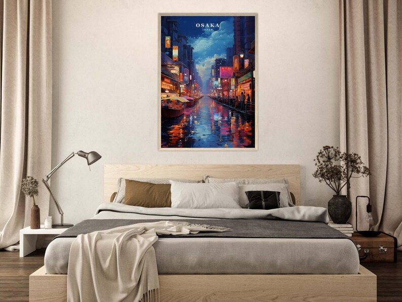 May include: A painting of a city street scene at night in Osaka, Japan. The street is lined with buildings and streetlights, and there is a river in the center of the image. The sky is dark blue, and there are stars visible.