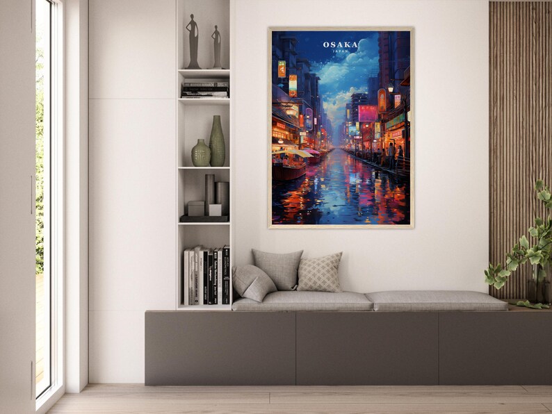 May include: A painting of a nighttime cityscape in Osaka, Japan. The painting features a canal with boats and reflections of the city lights. The sky is a dark blue with a few clouds. The buildings are lit up with neon signs and streetlights. The painting is framed in a wooden frame.