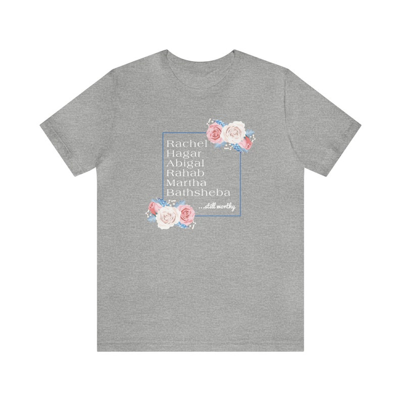May include: Gray t-shirt with a floral design and the text "Rachel, Hagar, Abigal, Rahab, Martha, Bathsheba...still worthy" in a white box.