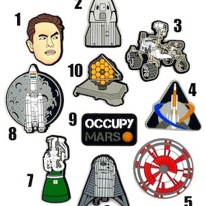 May include: Ten colorful enamel pins featuring space exploration themes. The pins include a rocket ship, a space shuttle, a moon landing, a space telescope, a rover, a space suit, and a cartoon of Elon Musk. The pins are perfect for collectors or anyone who loves space.