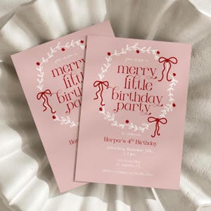 May include: Two pink birthday party invitations. Each card features a white wreath with red bows and berries, and the text "merry little birthday party." The invitations include details for Harper's 4th birthday.