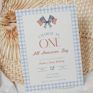 May include: A blue and white checked invitation with the text "CHARLIE IS ONE All American Boy." The invitation features watercolor American flags and details for a first birthday celebration.