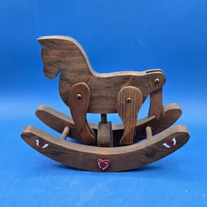 Vintage Handcrafted Wooden Rocking Horse: Rustic Nursery Decor