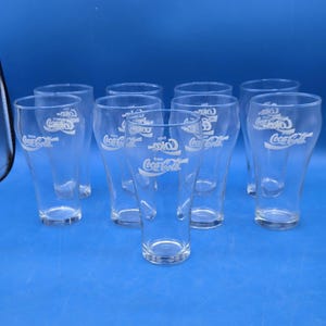 Vintage Set of 9 Coca-Cola 14oz Glasses – White “Enjoy Coca-Cola” Lettering – Classic Retro Drinkware – 1980s Coke Tumblers