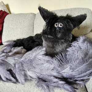 Feathered furby with 3D printed faceplate