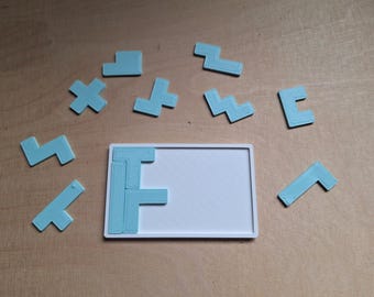 Rompecabezas de pentominó en 2D, prueba de coeficiente intelectual, desafío en 2D