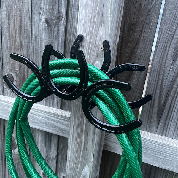 Horseshoe hose/rope holder