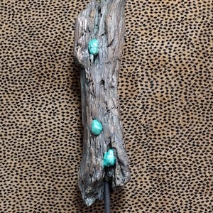 Escultura de madera flotante - II