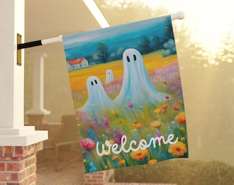May include: A colorful welcome flag with three white ghosts in a field of flowers. The flag reads "welcome" in white cursive lettering.