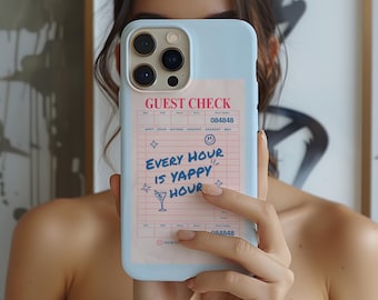 May include: A light blue phone case with a pink and blue design. The case features a guest check with the text "Every Hour is Yappy Hour" and a cartoon glass of wine.