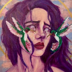 May include: An oil painting on canvas depicting a person with dark purple hair and white eyes. Two green and white hummingbirds are positioned near the eyes, with their beaks touching the tear ducts. A gold circular halo frames the head against a sky.