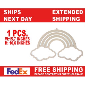 May include: A wooden rainbow with two clouds, measuring 15.7 inches wide and 10.6 inches high. The rainbow is made of three layers of wood, with the top layer being the widest. The clouds are cut out of the wood and have a simple, rounded shape.