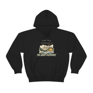 Vind je avontuur in de vrije natuur Unisex Heavy Blend Hooded Sweatshirt