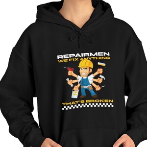 Repairmen: We Fix Anything That&#39;s Broken Unisex Heavy Blend™ Hooded Sweatshirt