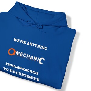 Mechanics: We Build Rocketships Unisex Heavy Blend™ Hooded Sweatshirt