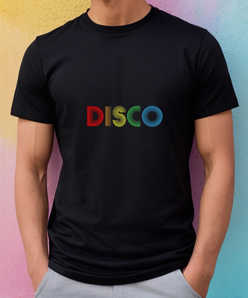 May include: A black t-shirt with a rainbow colored "DISCO" graphic.