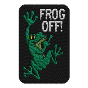 May include: Embroidered patch featuring a green frog with yellow eyes, gesturing with its hands. The text "FROG OFF!" is embroidered in white above the frog on a black background. The patch has a rectangular shape with rounded corners.