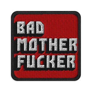May include: Embroidered patch with the words "BAD MOTHER FUCKER" in white, 3D-style lettering. The text is on a red background with a black border. The patch is square with rounded corners.