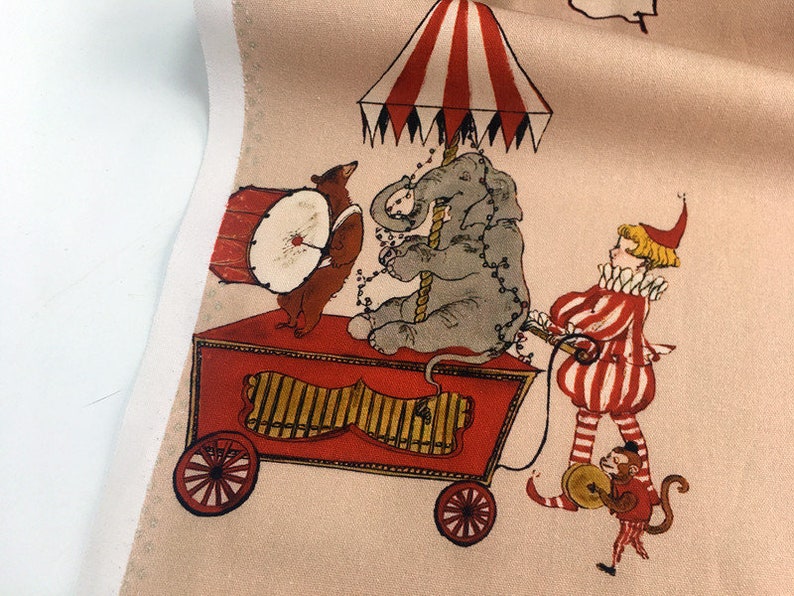 May include: A red and white striped circus tent with a red wagon carrying a gray elephant, a brown bear playing a drum, and a clown in a red and white striped costume. The wagon has a red and gold organ.