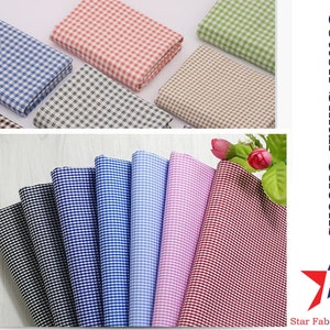 May include: Assortment of cotton fabric with small checks in various colors, including black, white, blue, red, pink, and gray.  The fabric is ideal for sewing projects, quilting, and crafts.  Cotton Small Checks. Star Fabrics Co.