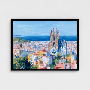 May include: A framed painting of a cityscape featuring a cathedral. The artwork uses a vibrant palette of blues, oranges, and pinks, depicting buildings, the sea, and a bright blue sky. The painting is in a black frame.