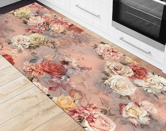 May include: A pink and white floral runner rug with a delicate floral pattern. The rug features a variety of roses, leaves, and stems in shades of pink, white, and green.