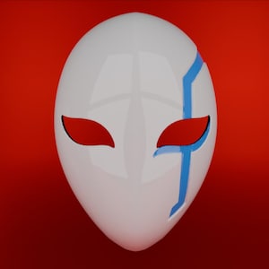 May include: White mask with a blue and red design. The mask has a long, pointed chin and two eye holes. The eye holes are outlined in black and filled with red. The blue design is a jagged line that runs down the right side of the mask.