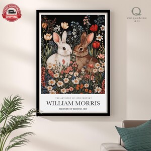 May include: A vintage-style poster featuring two rabbits in a field of flowers. The poster is titled "The Artistry of 19th Century William Morris" and "History of British Art".